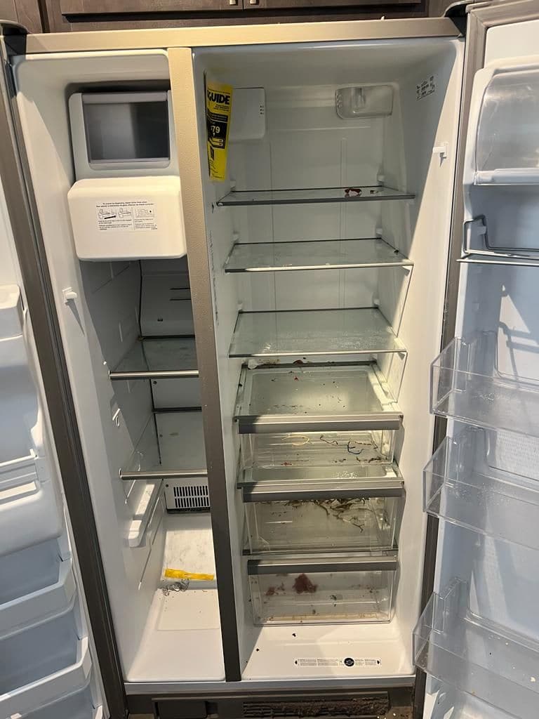 a refrigerator before cleaning by Magic Cleaning
